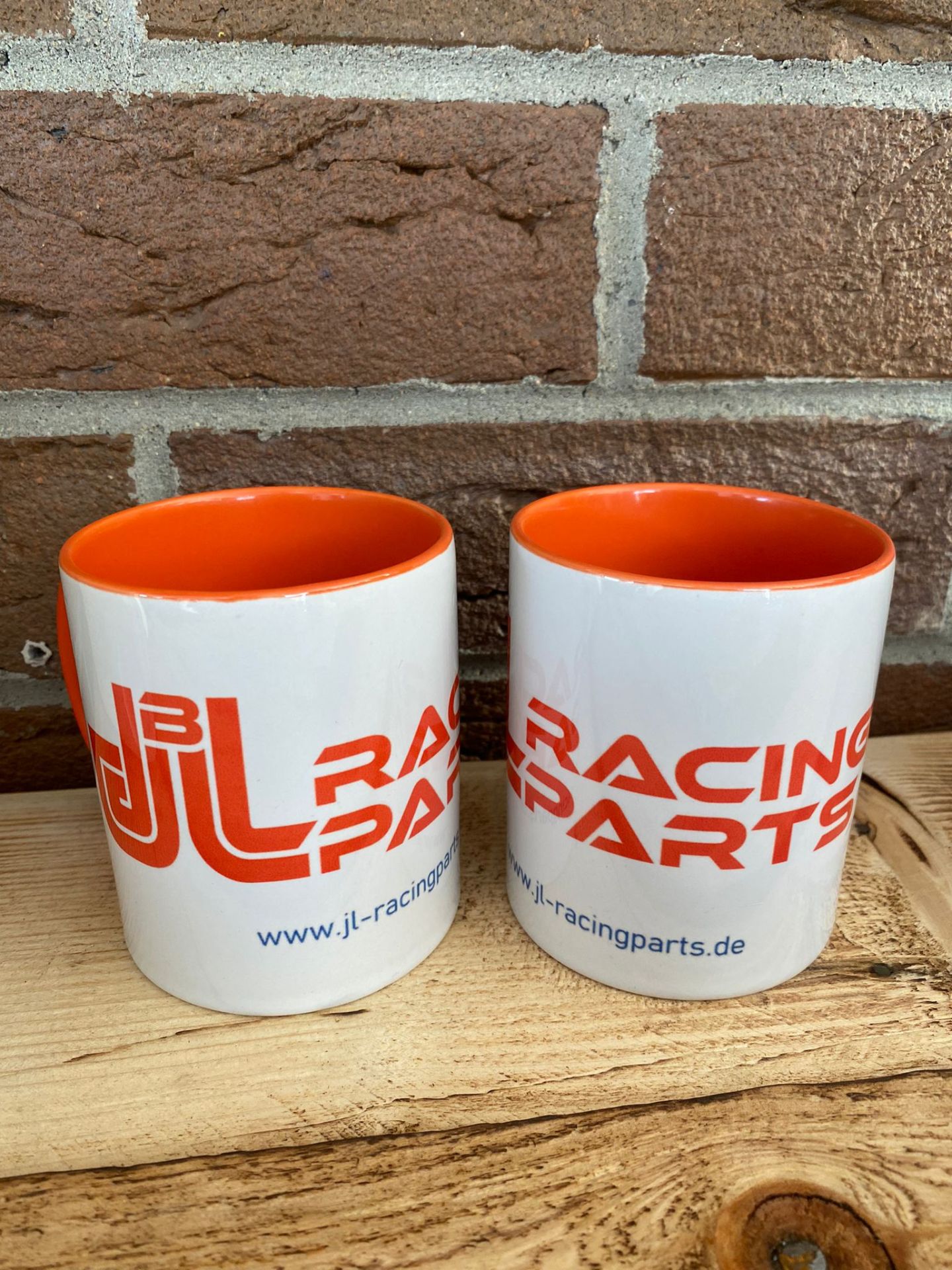 Tasse weiß / orange, bedruckt